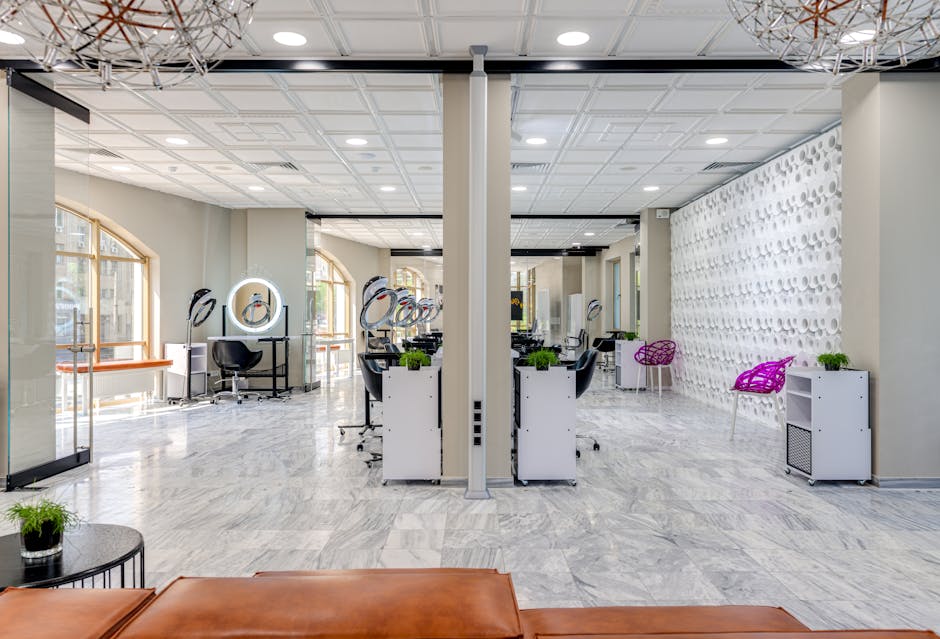 A sleek and modern beauty salon featuring chic design and comfortable seating areas
